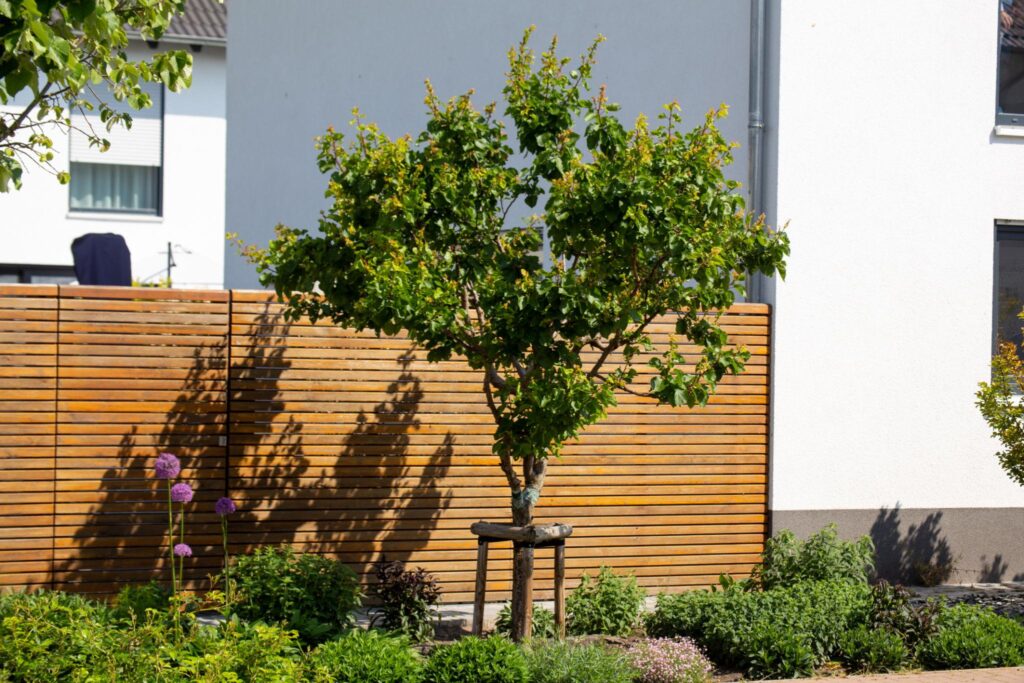 Garden fencing installation in Bristol with wooden panels